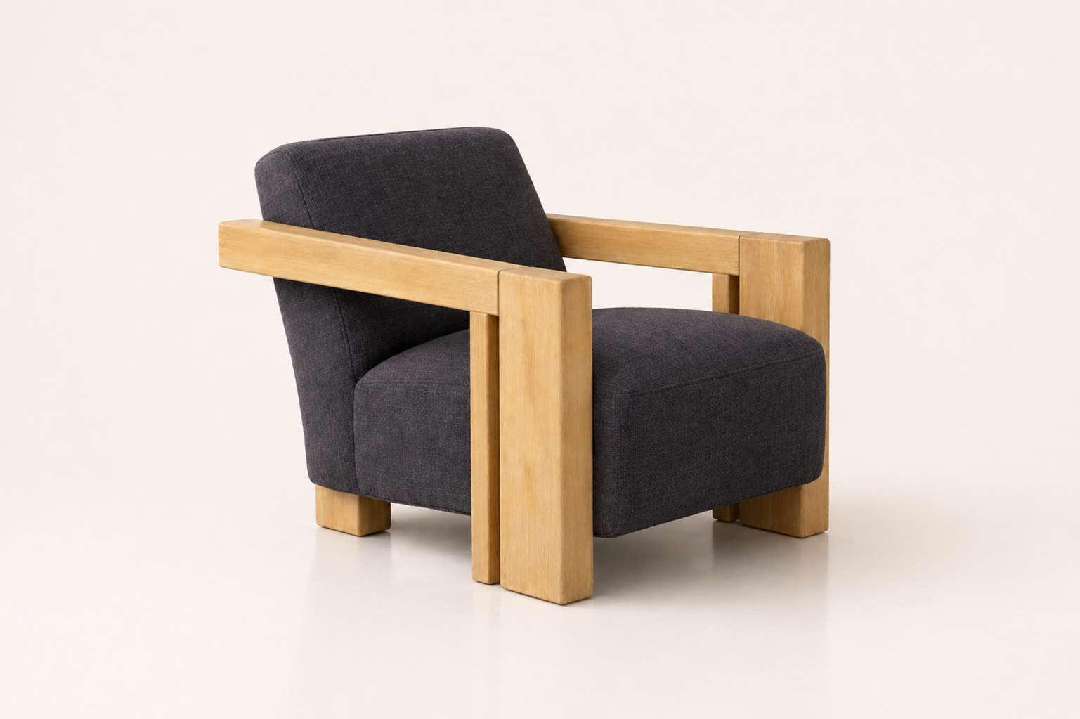 the LINDA occasional chair in dark charcoal fabric (BASALT NOIR)