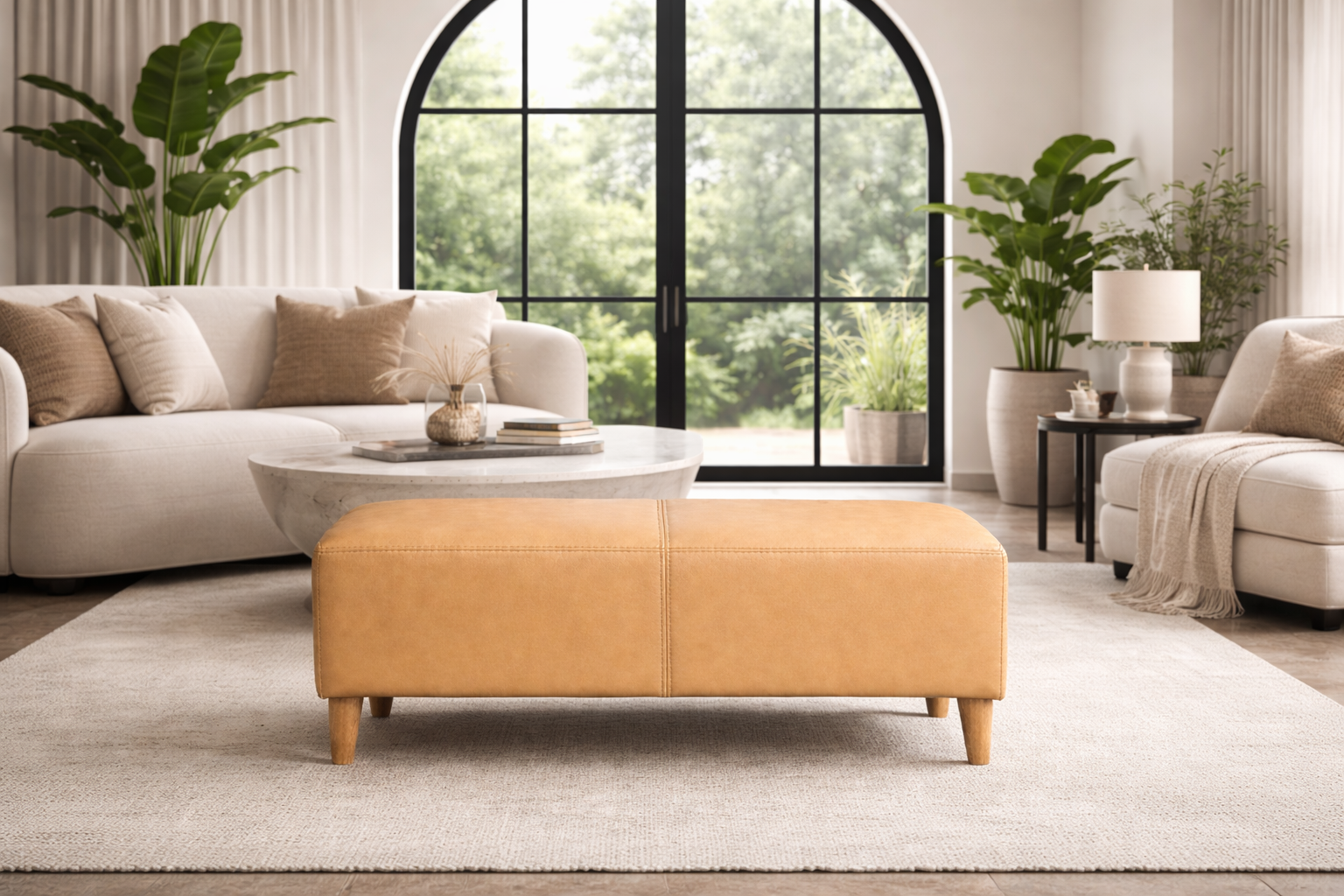 the BETTIE ottoman in a styled room setting