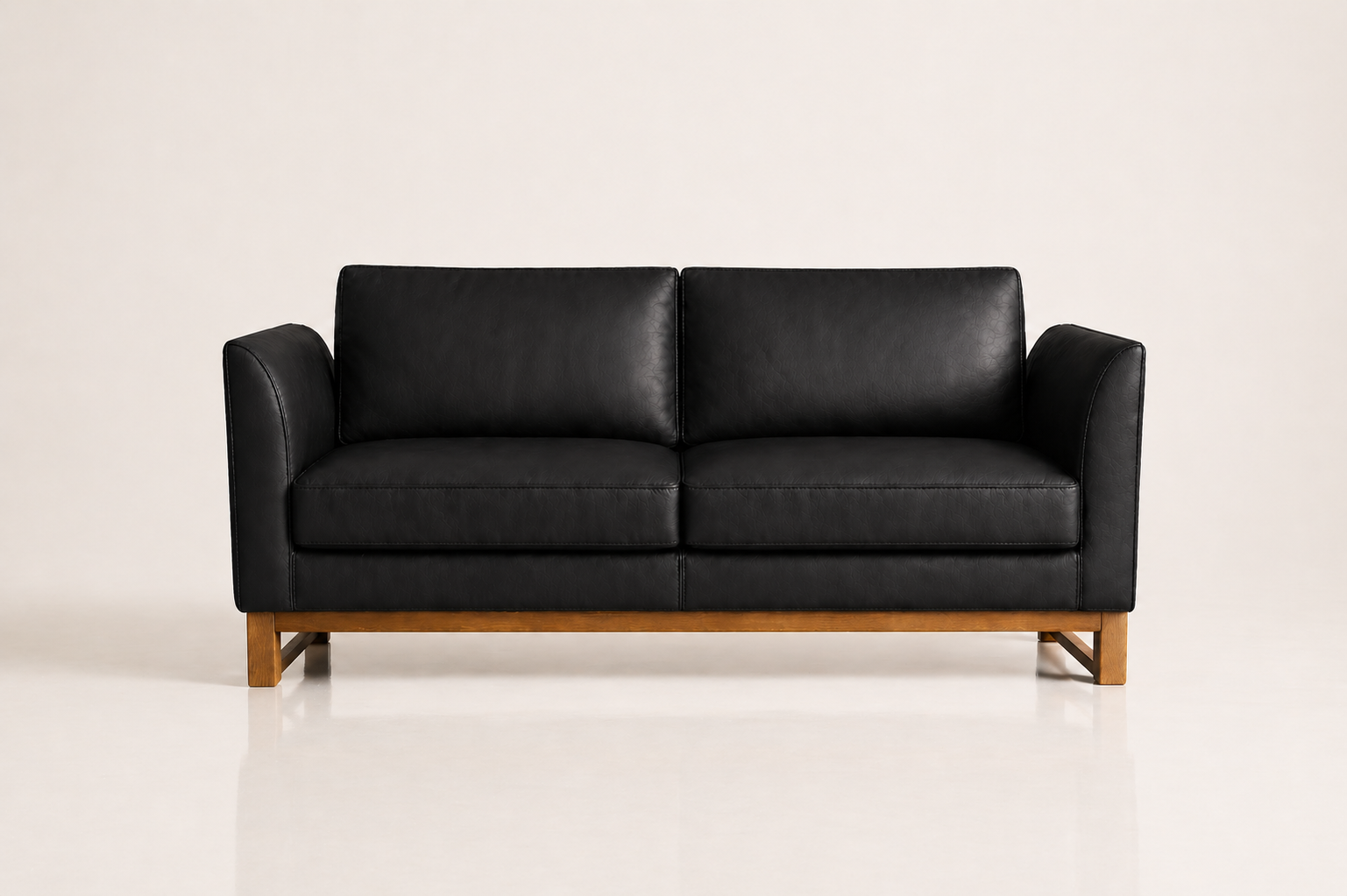the CHANTALLE sofa in black full-grain leather (BLACK RAIN)