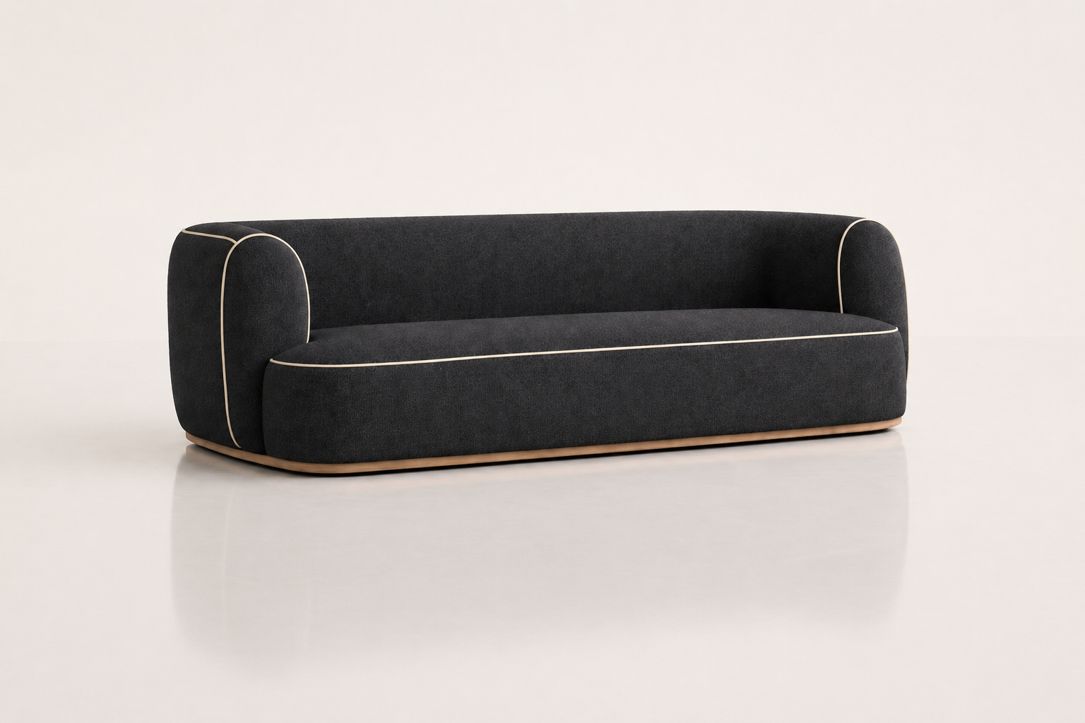 the SHANÉ sofa in dark charcoal (BASALT NOIR)