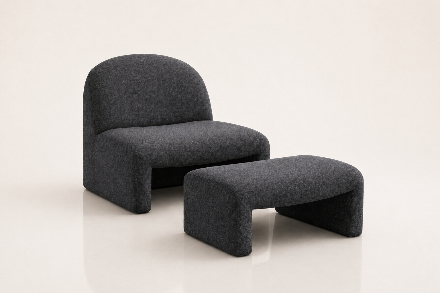 the RUMÉ unwind chair in dark charcoal (BASALT NOIR)